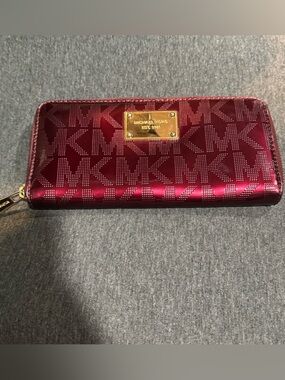 Michael Kors Magenta Logo Zip-Around Wallet with Gold Plaque